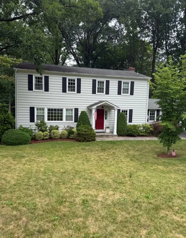 Colonial-style home with red front door and freshly installed roof, Somerset County, NJ